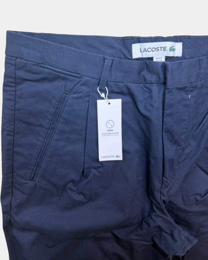 Lacoste chinot tummansininen – FR 44 / US 34, uusi